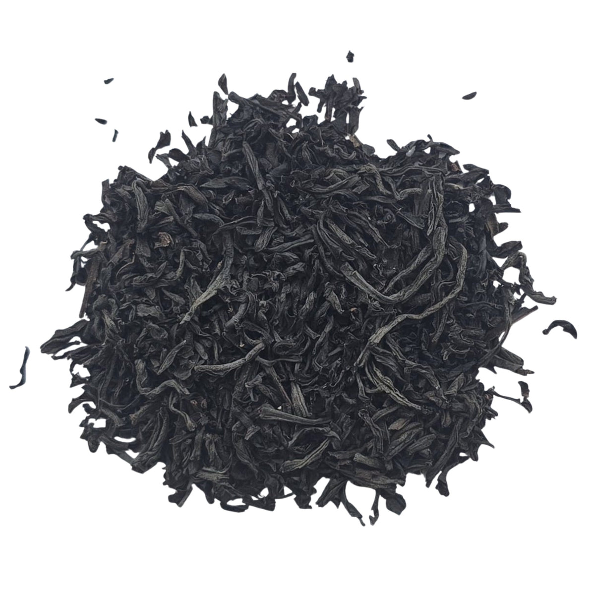 Loose leaf Ceylon black tea on a white background